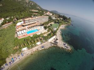 an aerial view of a hotel and the ocean at CORFU MARIS BELLOS in Benitses