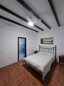 Ліжко або ліжка в номері Casa Rural Alberquillas