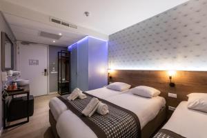 Postel nebo postele na pokoji v ubytování Melrose Hotel