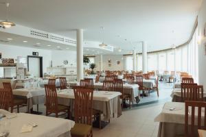 ห้องอาหารหรือที่รับประทานอาหารของ Hotel Santo Stefano