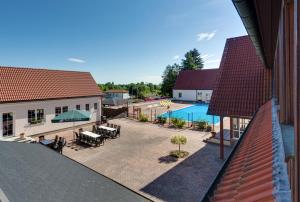 an overhead view of a courtyard with a swimming pool at Sportschule Werdau in Werdau