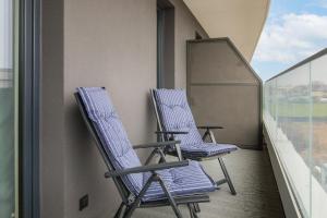 Balkón alebo terasa v ubytovaní Baltic Marina Residence Sauna & Fitness Apartments by Noclegi Renters + 23 fotografií