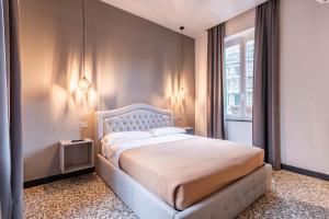 Ένα ή περισσότερα κρεβάτια σε δωμάτιο στο HNN Luxury Apartments