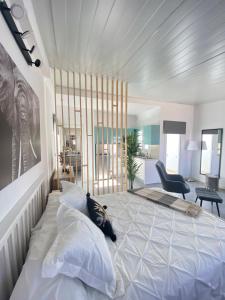 A bed or beds in a room at Villa Residencial El Guaidil