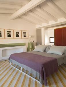 a bedroom with a large bed in a room at Palazzo Luce in Lecce