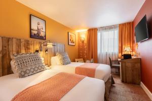 Krevet ili kreveti u jedinici u objektu Aiden by Best Western Paris Roissy CDG