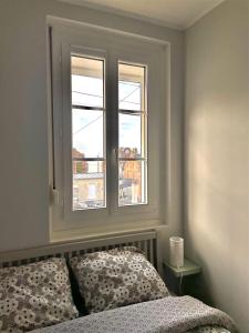 Postel nebo postele na pokoji v ubytování Les Courlis - app cosy et proche mer Ault + 10 fotografií