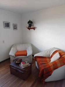 Ein Sitzbereich in der Unterkunft Habitación Privada en Mongui
