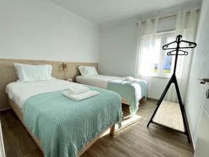 Postel nebo postele na pokoji v ubytování Casa da Ana - Country Home