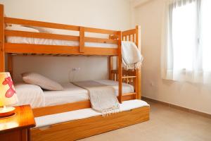 Posteľ alebo postele v izbe v ubytovaní UHC COSTA PINOSMAR APARTMENTS