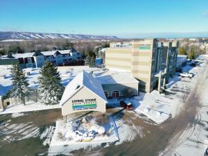 an aerial view of a building in the snow at Living Stone Golf Resort in Collingwood