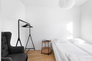 Postel nebo postele na pokoji v ubytování Cozy duplex at Heikinlaakso
