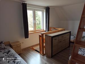 Posteľ alebo postele v izbe v ubytovaní Apartameny Wiktoria i Nikola w Karwiku