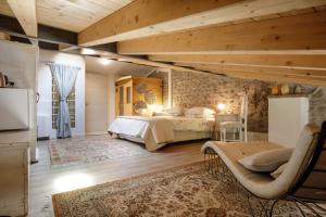 Ένα ή περισσότερα κρεβάτια σε δωμάτιο στο GardaBeds Adults Only