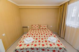 Postel nebo postele na pokoji v ubytování Old Tiflis 5