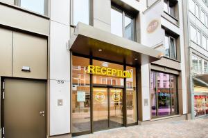 a store front of a store with a prescription sign on it at B&B Hotel Aachen-City in Aachen