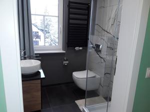Kúpeľňa v ubytovaní Villa Malinka