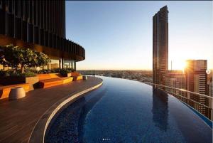 a swimming pool on the roof of a building at Executively Inspired - The Hutt in Brisbane