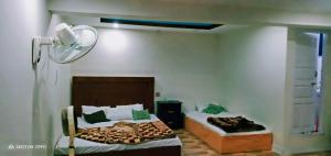 Postel nebo postele na pokoji v ubytování Hotel Saspolo skardu