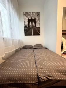 Una cama o camas en una habitación de Savi Apartment 3