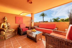 a living room with a couch and chairs at Los Lagos Golf II Charming 3 bedroom apartment in Marbella in Marbella