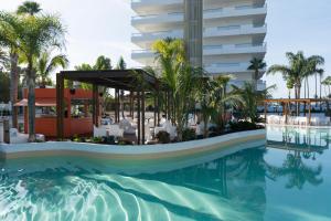 a rendering of the pool at the resort at Hotel Gran Canaria Princess - Adults Only in Playa del Ingles