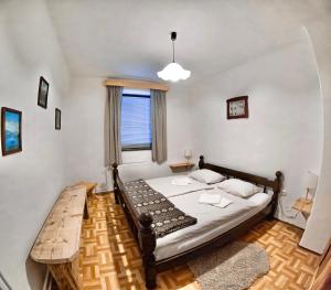 Postel nebo postele na pokoji v ubytování Alpine Home - Rooms