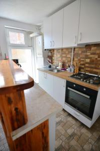 A cozinha ou cozinha compacta de Casa cu Magnolii