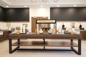 a large table in a kitchen with a counter top at Hampton Inn Lead in Lead