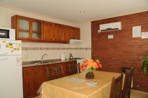 Virtuvė arba virtuvėlė apgyvendinimo įstaigoje Complejo Mi Sueño