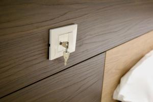 Postel nebo postele na pokoji v ubytování B&B DEGLI ANGELI