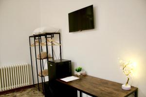 TV a/nebo společenská místnost v ubytování B&B DEGLI ANGELI