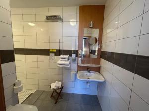 Koupelna v ubytování Auberge Des Mésanges