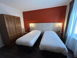 Postel nebo postele na pokoji v ubytování Auberge Des Mésanges