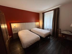 Postel nebo postele na pokoji v ubytování Auberge Des Mésanges