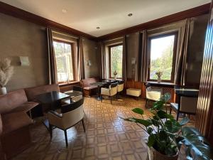 Posezení v ubytování Auberge Des Mésanges