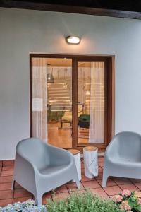 Posedenie v ubytovaní Yuhom, casas con alma, Xacedos 1