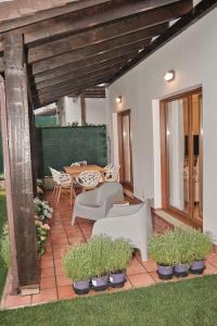 Posedenie v ubytovaní Yuhom, casas con alma, Xacedos 1