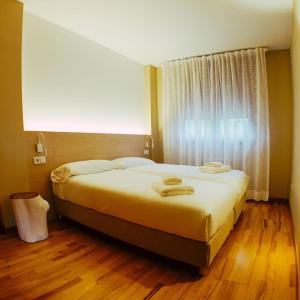 Posteľ alebo postele v izbe v ubytovaní Yuhom, casas con alma, Xacedos 1