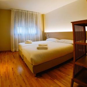Posteľ alebo postele v izbe v ubytovaní Yuhom, casas con alma, Xacedos 1