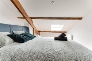 Posteľ alebo postele v izbe v ubytovaní Duplex Moderne Cosy - Proche Porte d'Italie - Parking