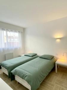 Posteľ alebo postele v izbe v ubytovaní Splendide T3 haut standing avec parking privé