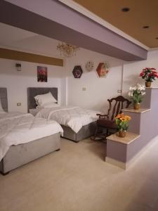 Postel nebo postele na pokoji v ubytování Cozy fully furnished studio