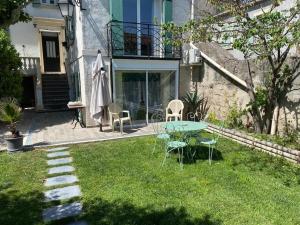 Vonkajšia záhrada v ubytovaní Charmant studio avec jardin