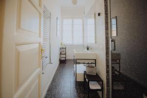 a bathroom with a sink and a mirror at A casa di Giulia in Latina +18 photos