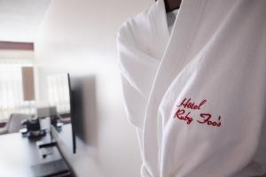 Телевізор і / або розважальний центр в Hotel Ruby Foo's