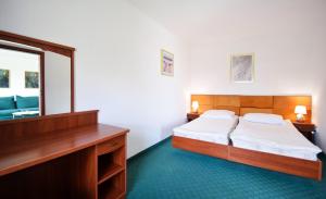 Posteľ alebo postele v izbe v ubytovaní Apartamenty Kołobrzeg Morska