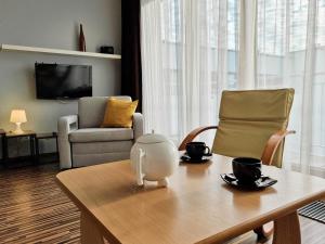 Telewizja i/lub zestaw kina domowego w obiekcie visit baltic - na Platanie