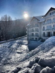 Apartament Pod Wyciągiem - Czarna Góra Resort & SPA žiemą
