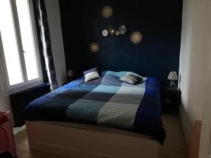 Posteľ alebo postele v izbe v ubytovaní 100m plage- 4 Chambres-quartier classé *bleu-mers*